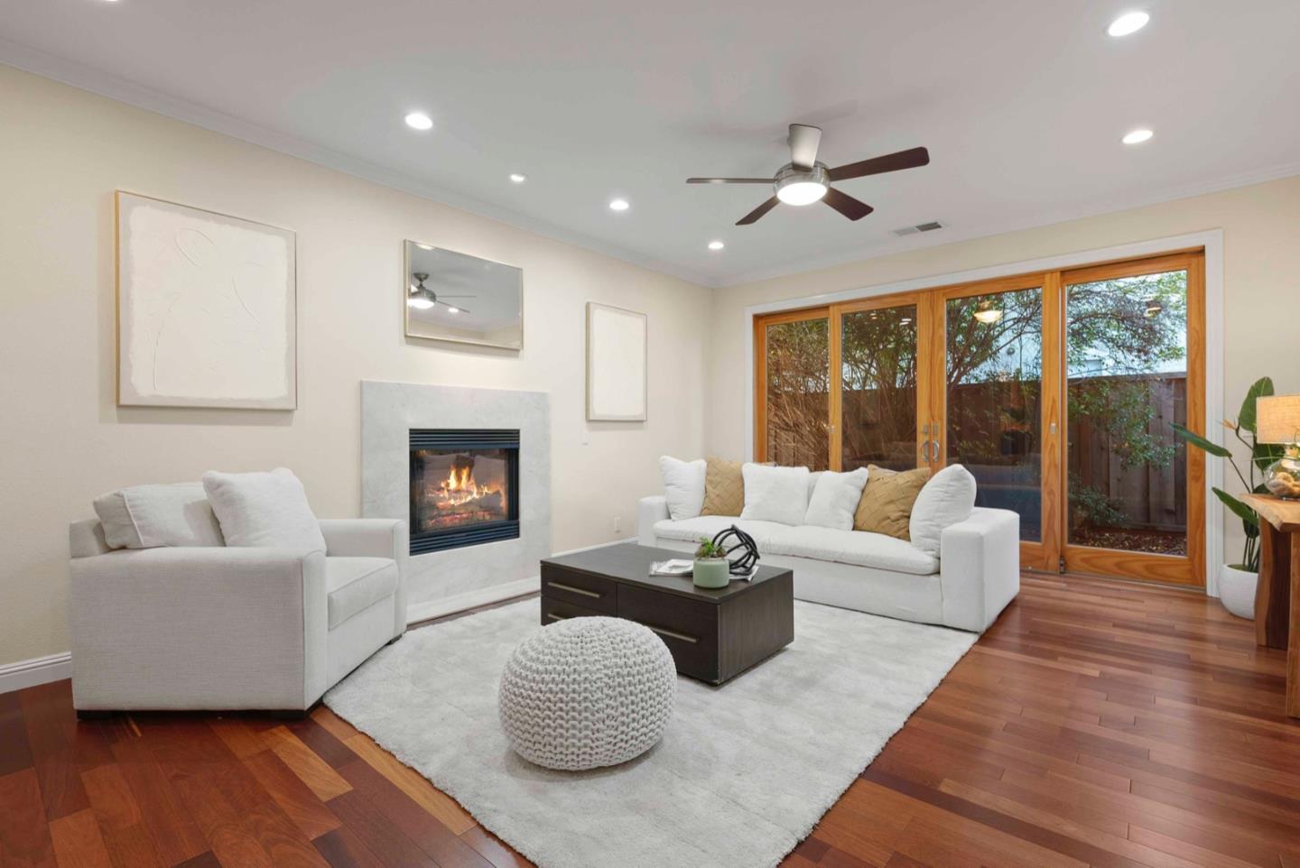 18373 Vanderbilt Drive Saratoga, CA 95070 - Photo 3 of 26 a living room with furniture and a fireplace