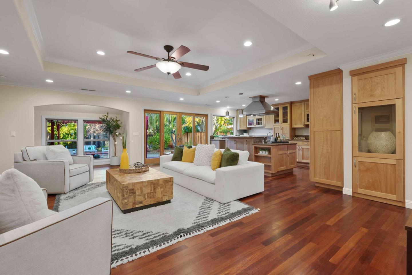 18373 Vanderbilt Drive Saratoga, CA 95070 - Photo 6 of 26 a living room with fireplace furniture and a wooden floor