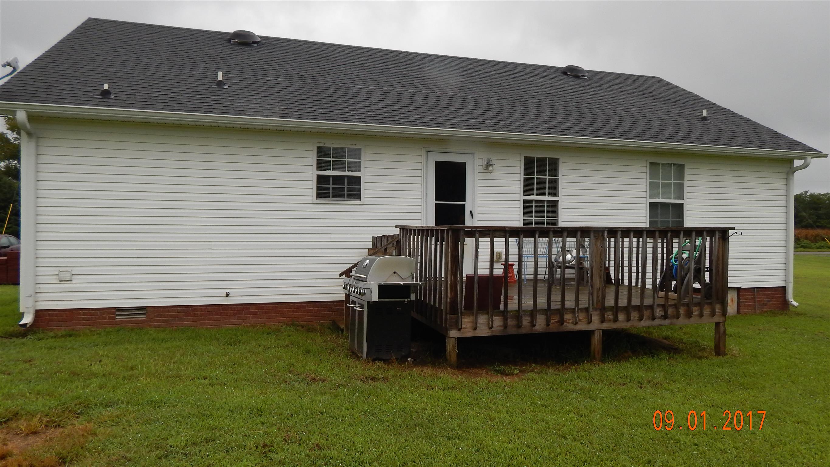 7 Myrick Road Flintville, TN 37335 - Photo 11 of 12 a view of a house with a backyard