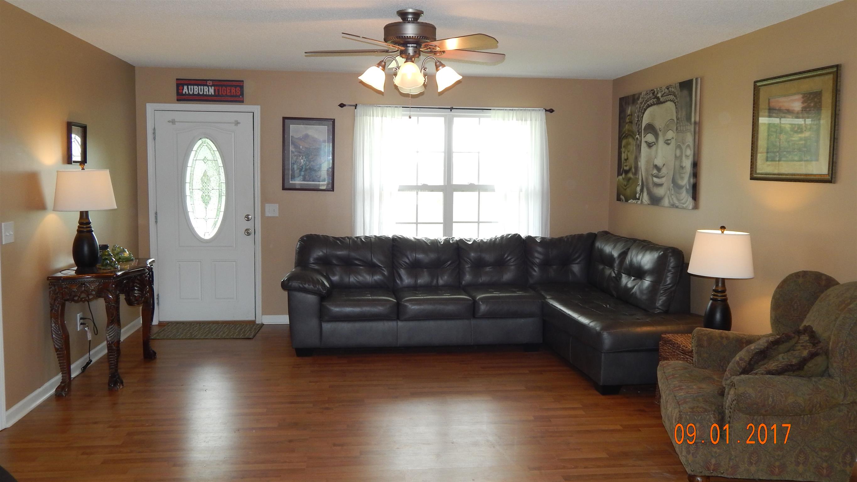 7 Myrick Road Flintville, TN 37335 - Photo 2 of 12 a living room with furniture chandelier and a window