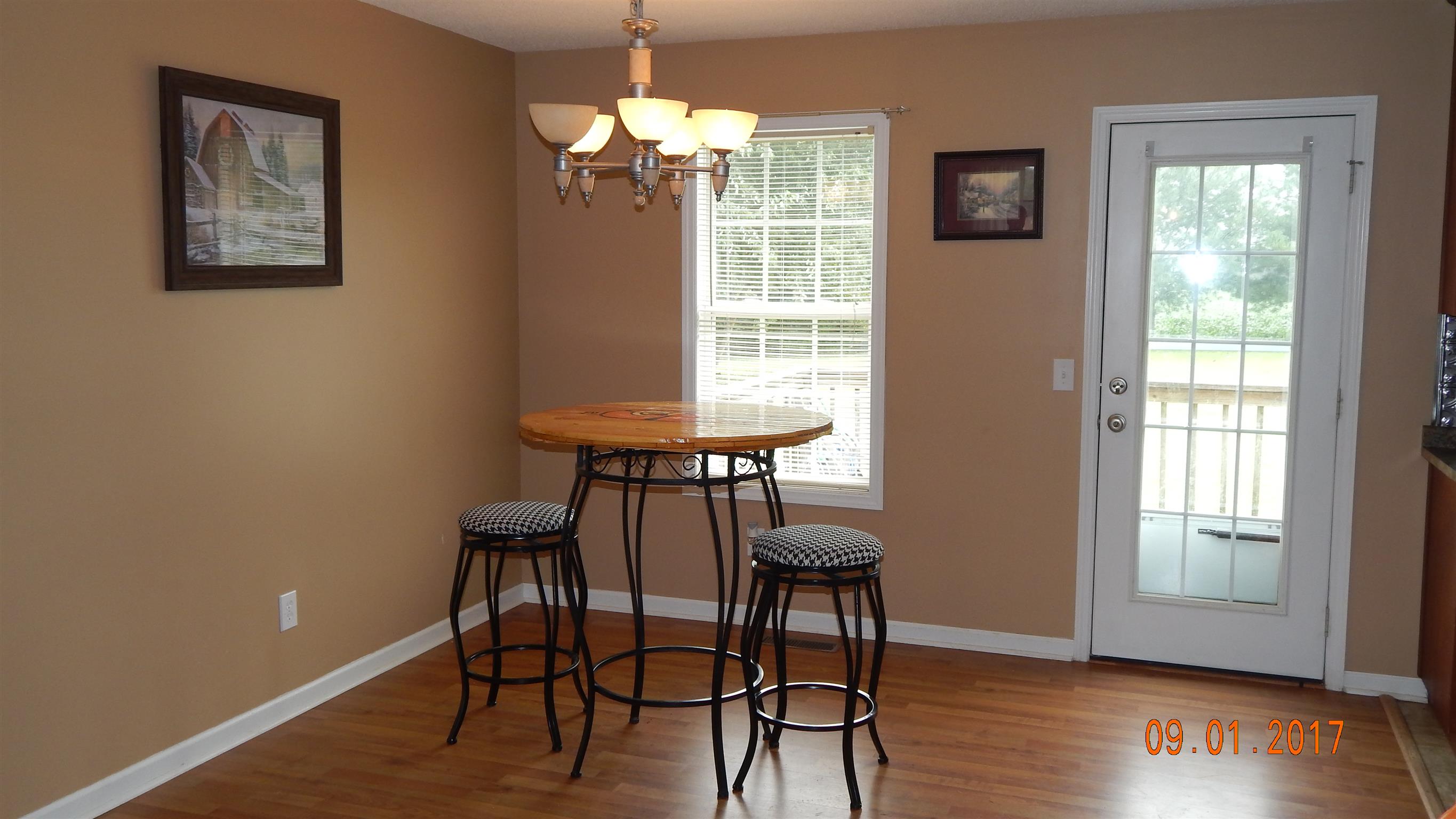 7 Myrick Road Flintville, TN 37335 - Photo 3 of 12 a view of a dining room with furniture window and wooden floor