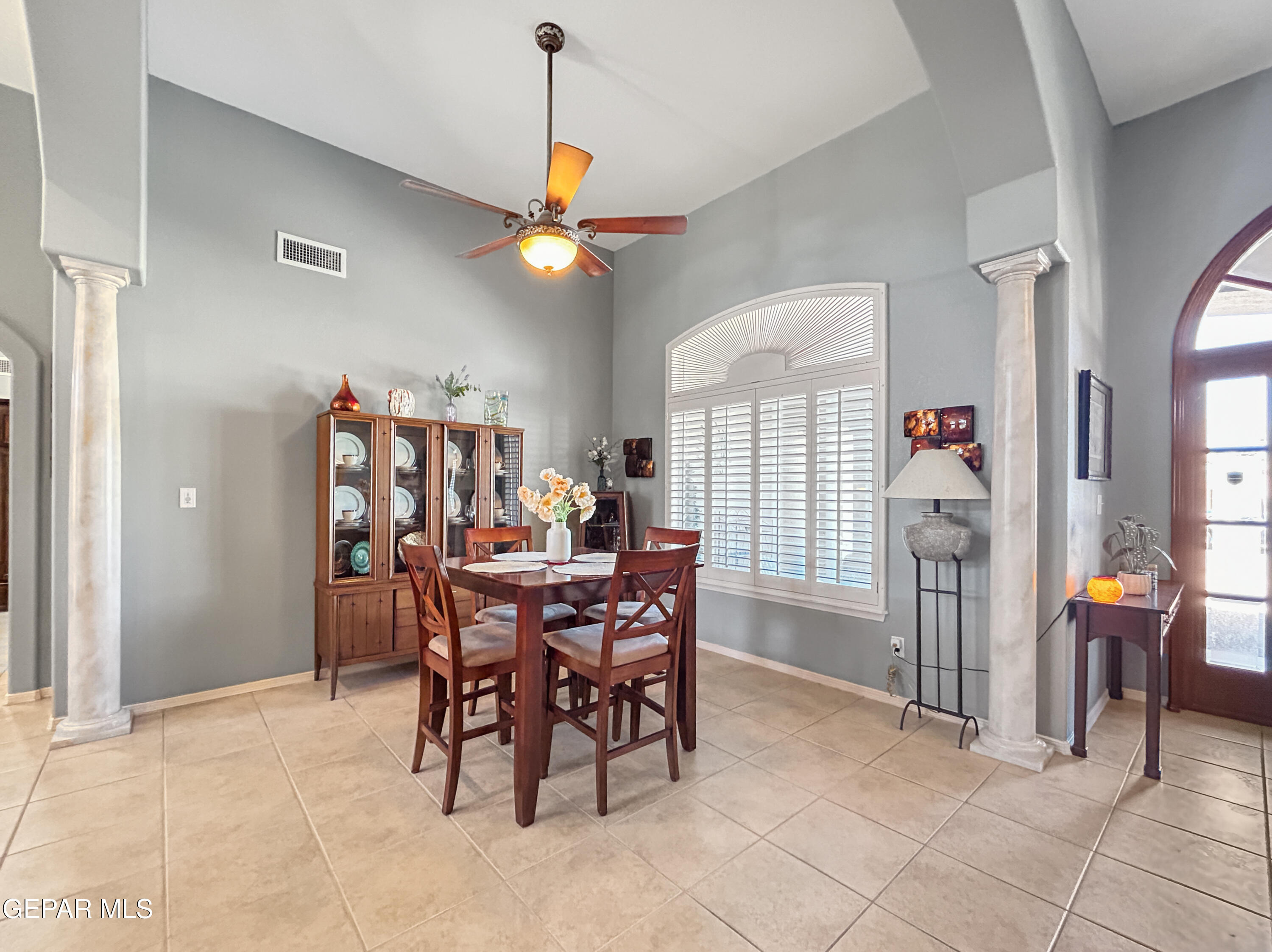 6680 Capitan Ridge El Paso, TX 79912 - Photo 19 of 47 a view of a dining room with furniture and chandelier