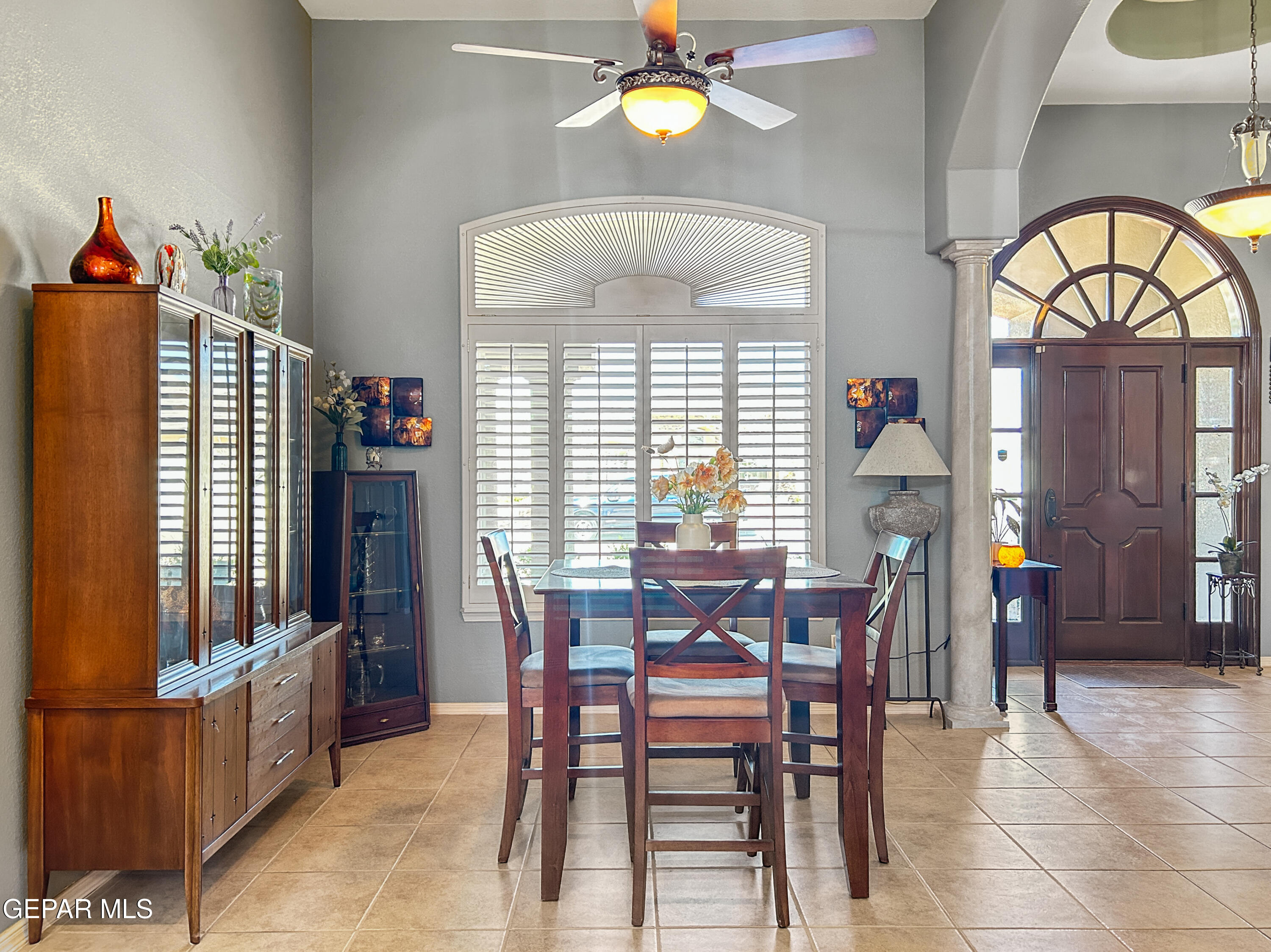 6680 Capitan Ridge El Paso, TX 79912 - Photo 20 of 47 a view of a dining room with furniture and chandelier