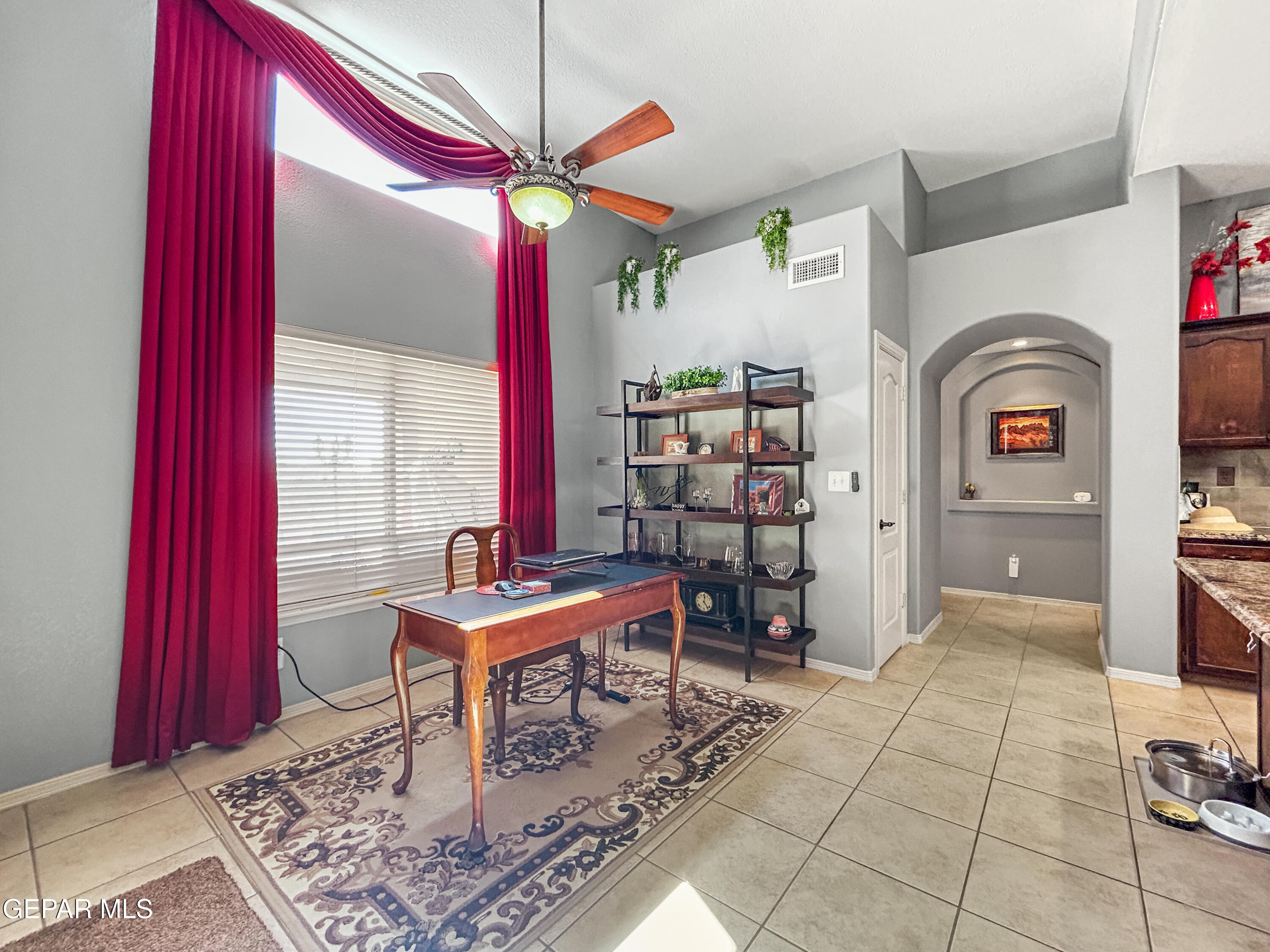 6680 Capitan Ridge El Paso, TX 79912 - Photo 35 of 47 a room with furniture and view of kitchen