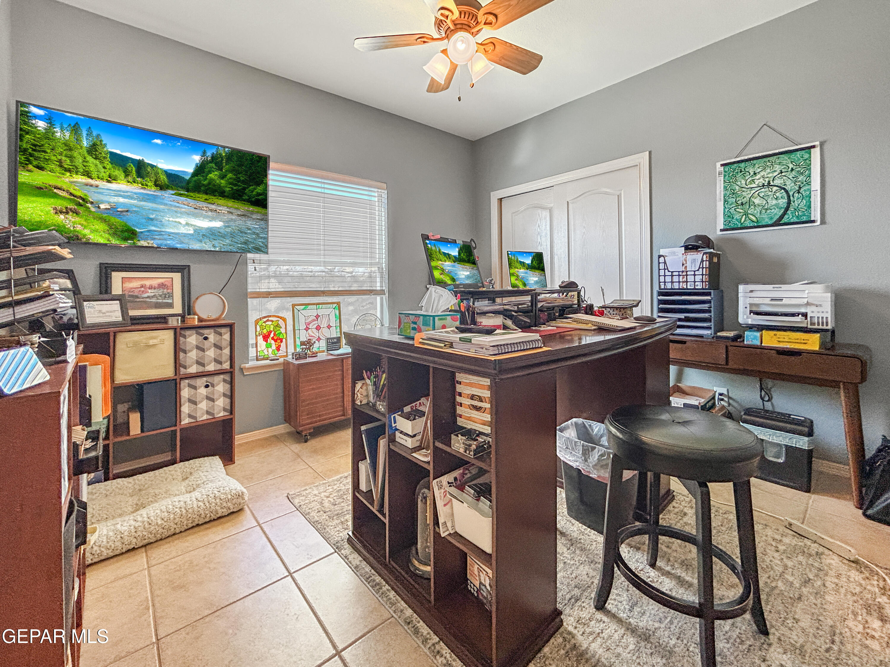 6680 Capitan Ridge El Paso, TX 79912 - Photo 38 of 47 a work place with kitchen island furniture and a chandelier