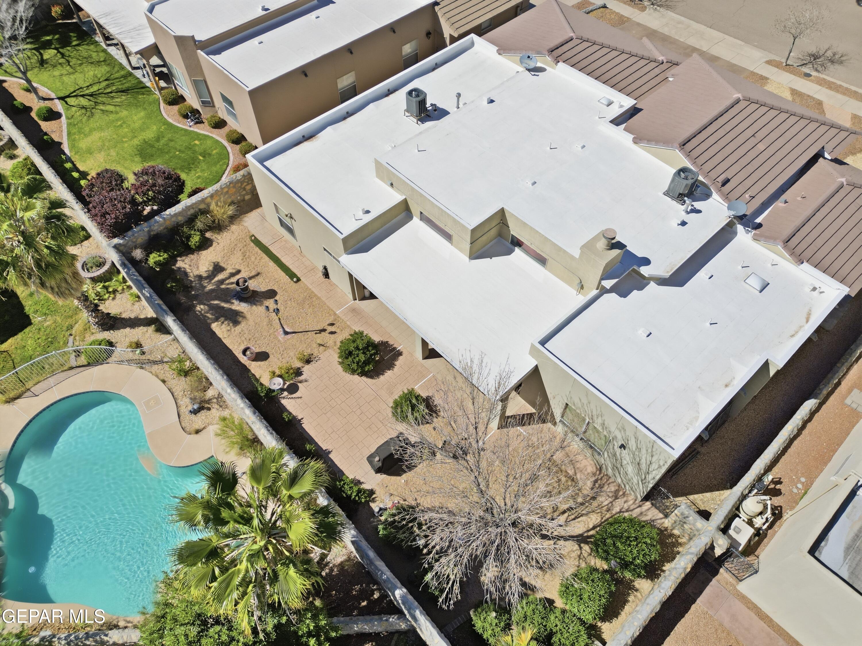 6680 Capitan Ridge El Paso, TX 79912 - Photo 47 of 47 an aerial view of a house with a yard