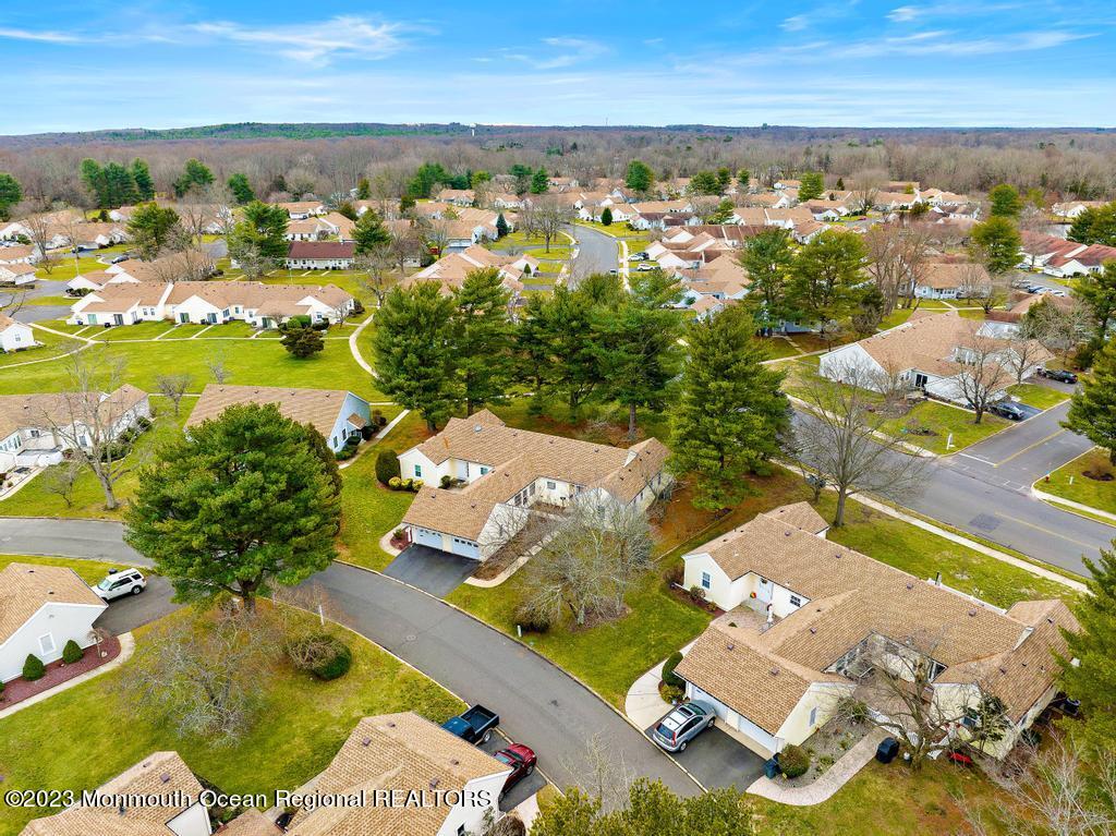 10 B Zacatin Road, Unit B Freehold, NJ 07728 - Photo 14 of 17 an aerial view of residential houses with outdoor space