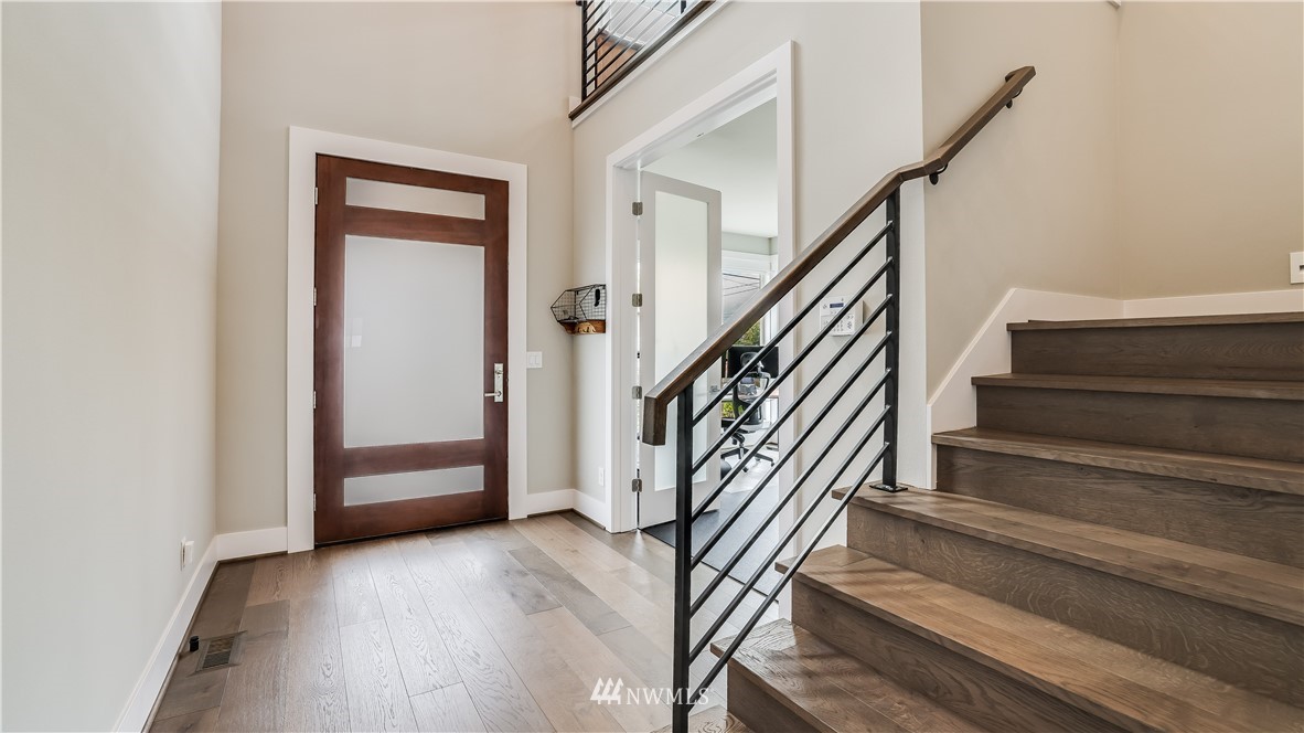 928 North 34th Street Renton, WA 98056 - Photo 3 of 29 a view of entryway and hall with wooden floor