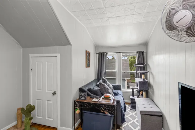 a room with furniture and a window