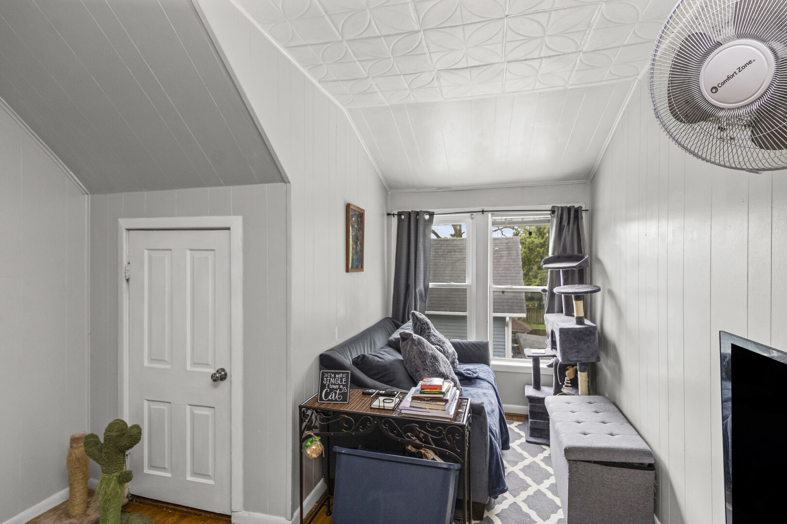 102 South Liberty Street, Unit 3 Elgin, IL 60120 - Photo 11 of 18 a room with furniture and a window