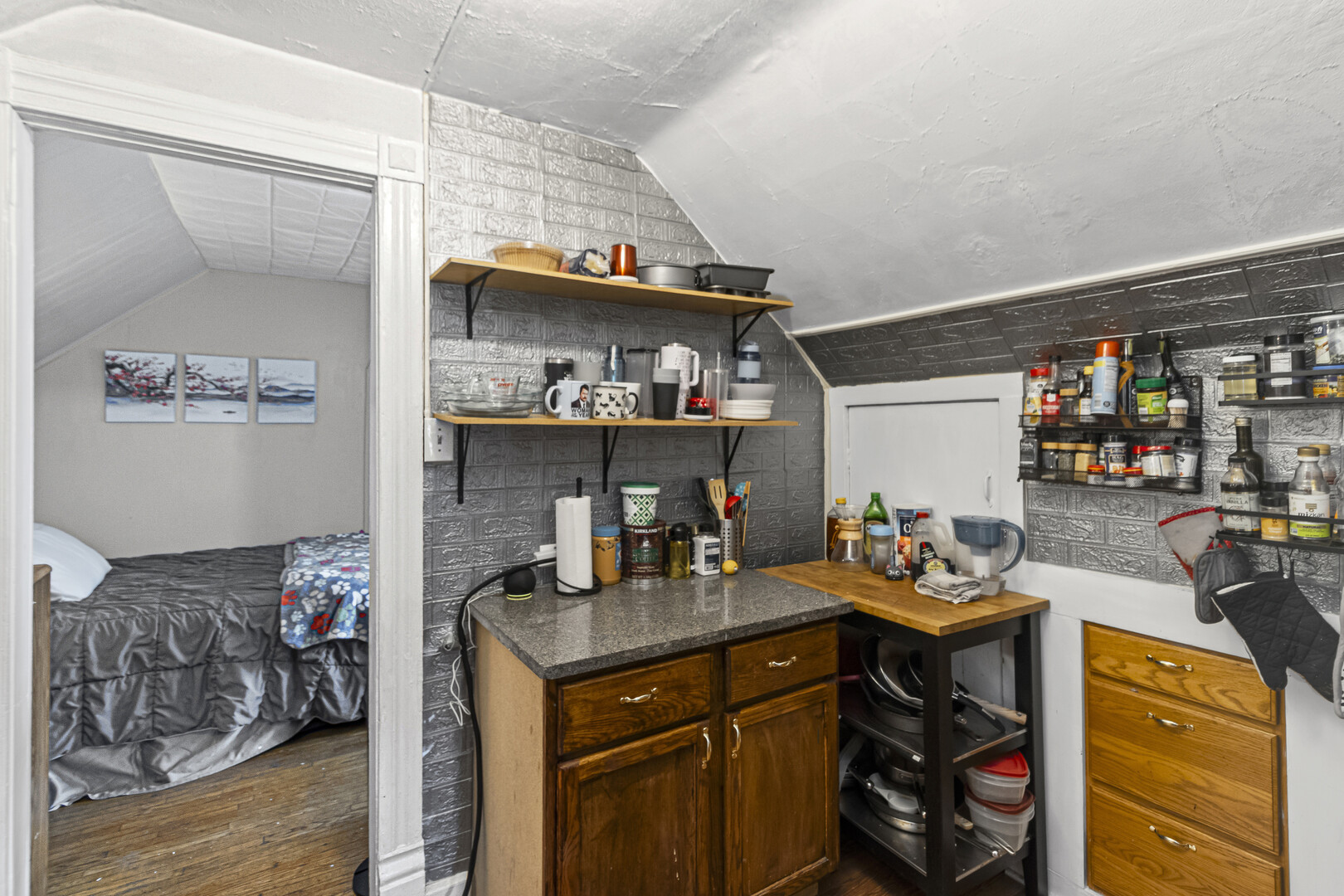 102 South Liberty Street, Unit 3 Elgin, IL 60120 - Photo 7 of 18 a kitchen with a sink and cabinets