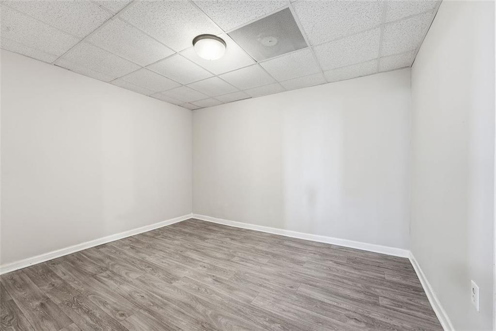 2328 Horseshoe Bend Road Southwest Marietta, GA 30064 - Photo 36 of 44 a view of an empty room with wooden floor