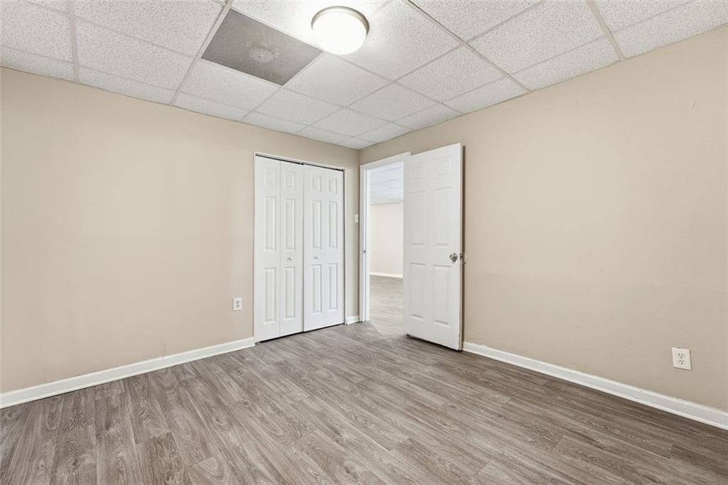 2328 Horseshoe Bend Road Southwest Marietta, GA 30064 - Photo 37 of 44 a view of an empty room with wooden floor