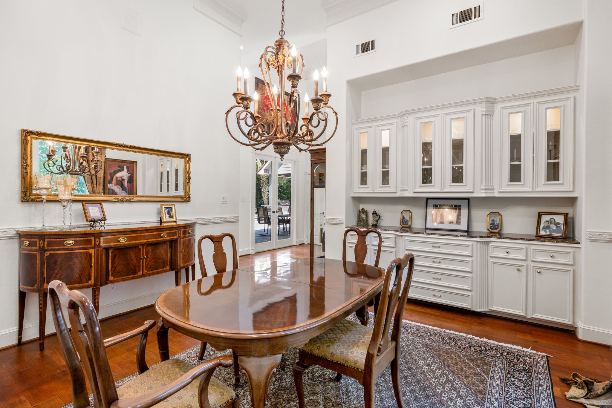 3018 McDonald Lane Spring, TX 77380 - Photo 6 of 48 a view of a dining room with furniture wooden floor and chandelier