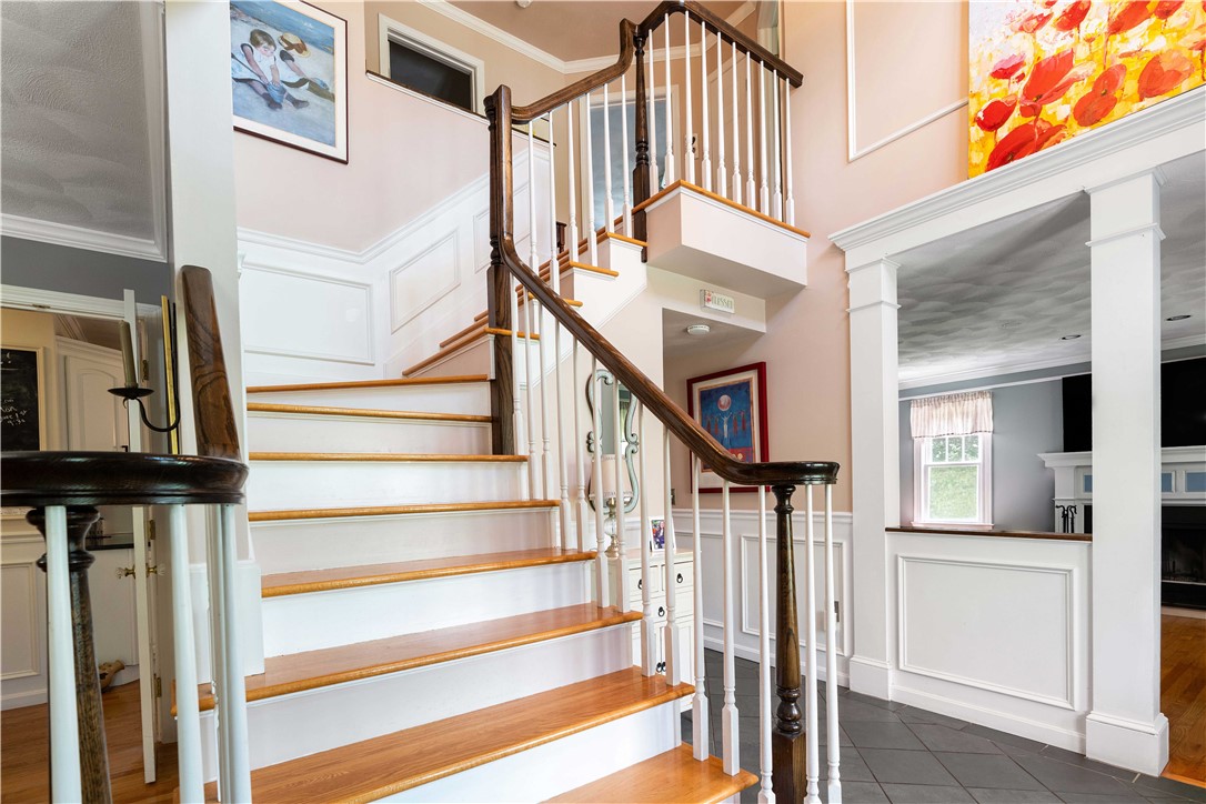 5 Victoria Lane Rehoboth, MA 02769 - Photo 6 of 48 Open grand entrance staircase & 15' ceiling, crown molding and raised paneling.