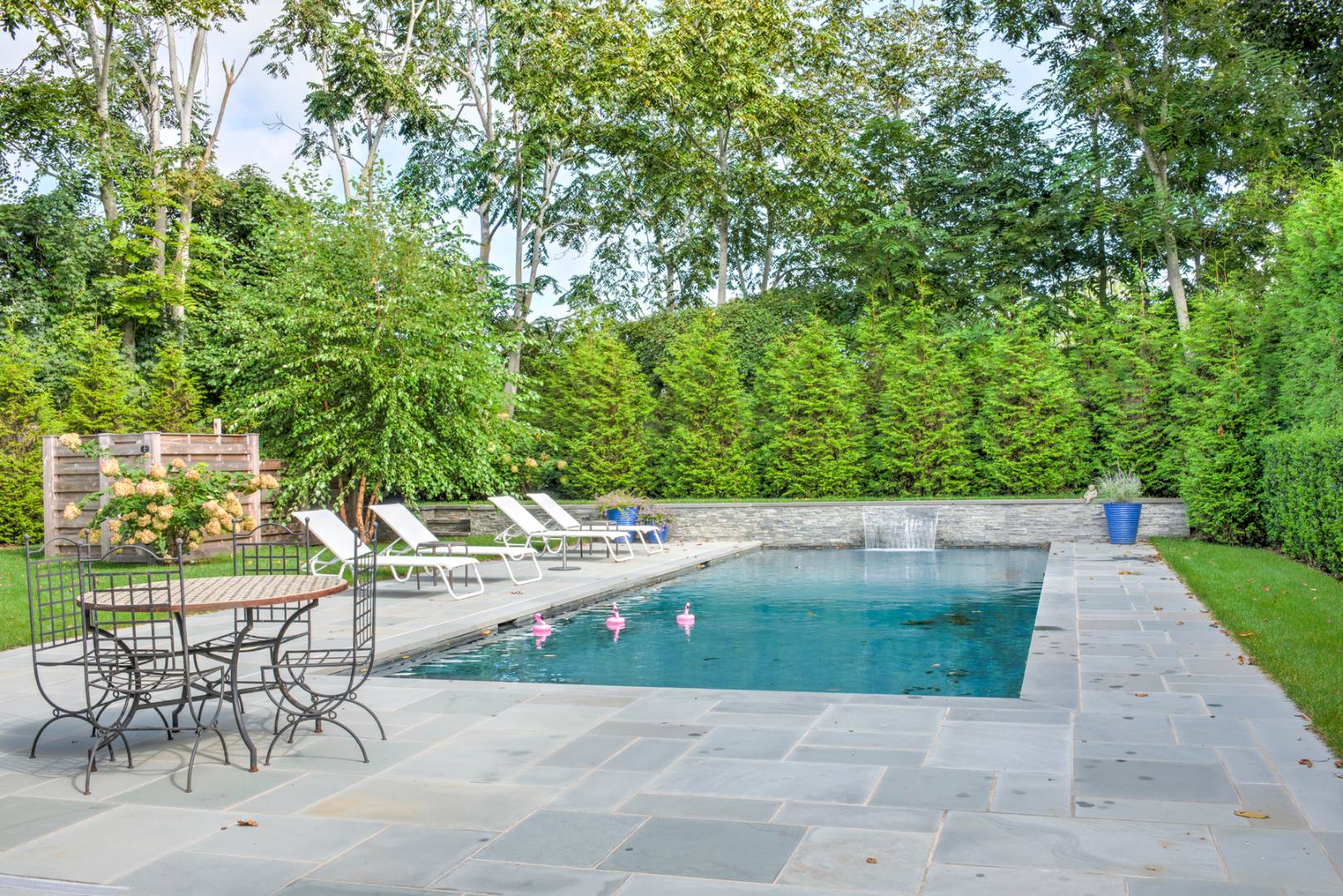 83 School Street Bridgehampton, NY 11932 - Photo 1 of 19 a view of a backyard with sitting area