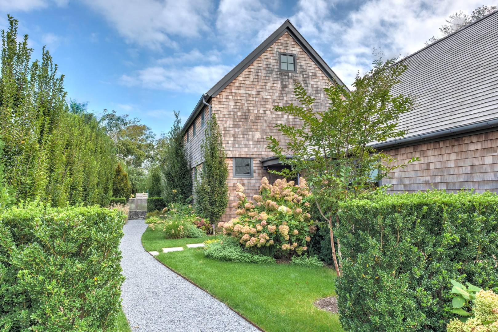 83 School Street Bridgehampton, NY 11932 - Photo 2 of 19 a aerial view of a house