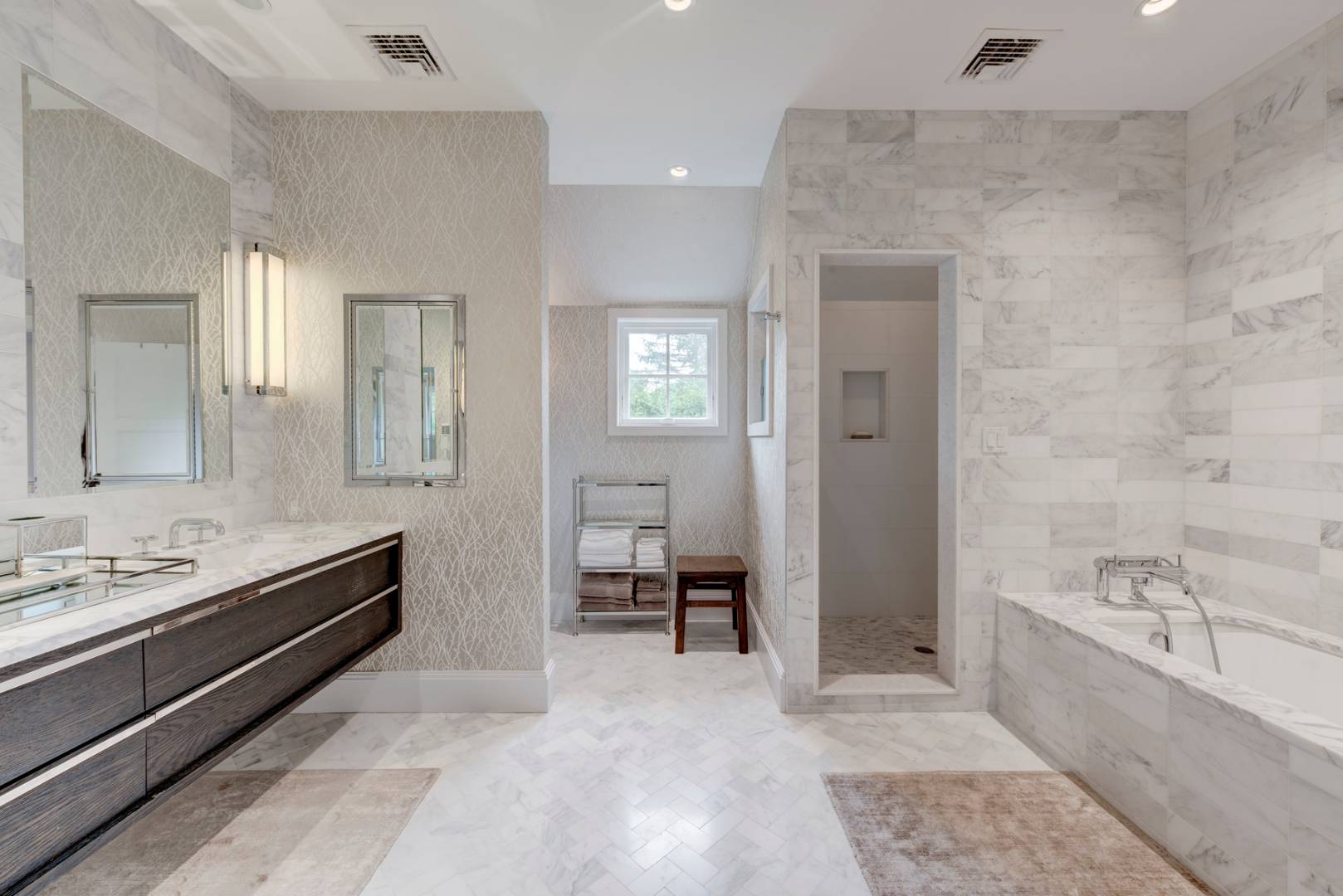 83 School Street Bridgehampton, NY 11932 - Photo 11 of 19 a spacious bathroom with a tub sink and mirror