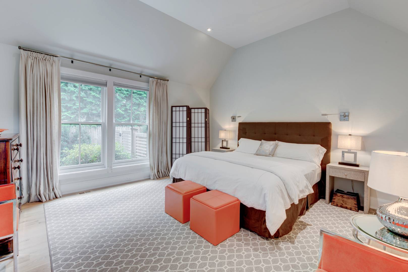 83 School Street Bridgehampton, NY 11932 - Photo 12 of 19 a bedroom with a large bed and a window