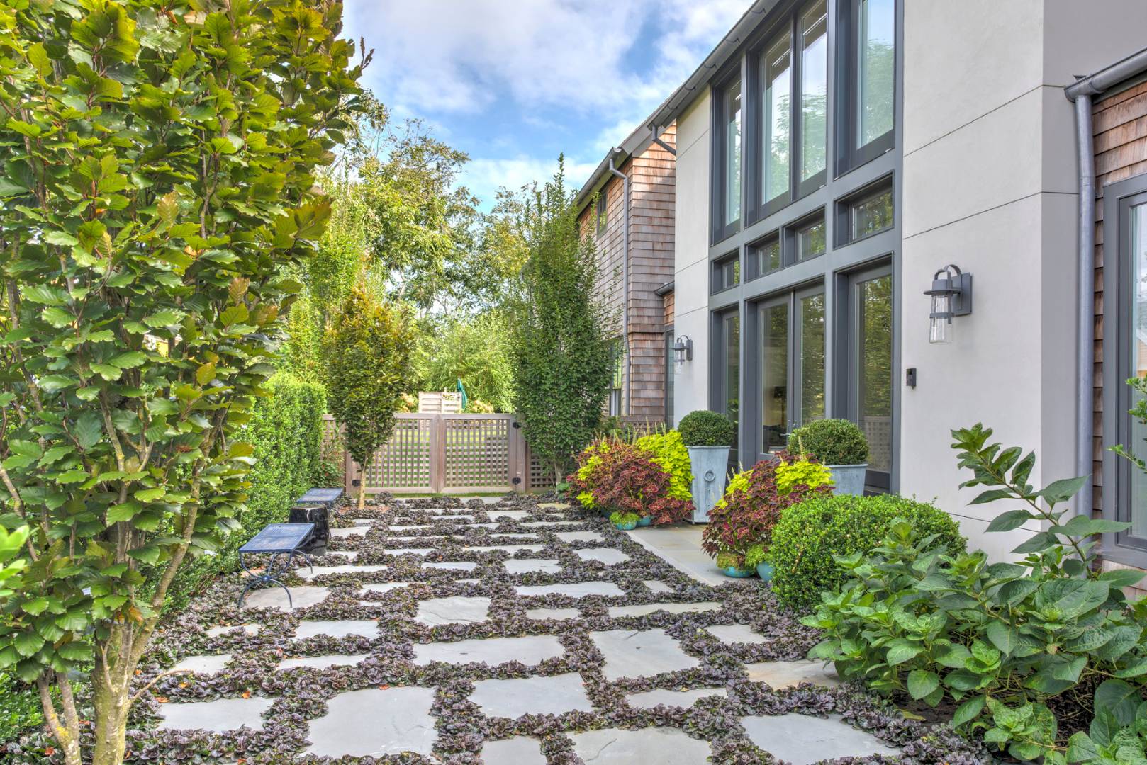 83 School Street Bridgehampton, NY 11932 - Photo 4 of 19 a view of a pathway with a yard