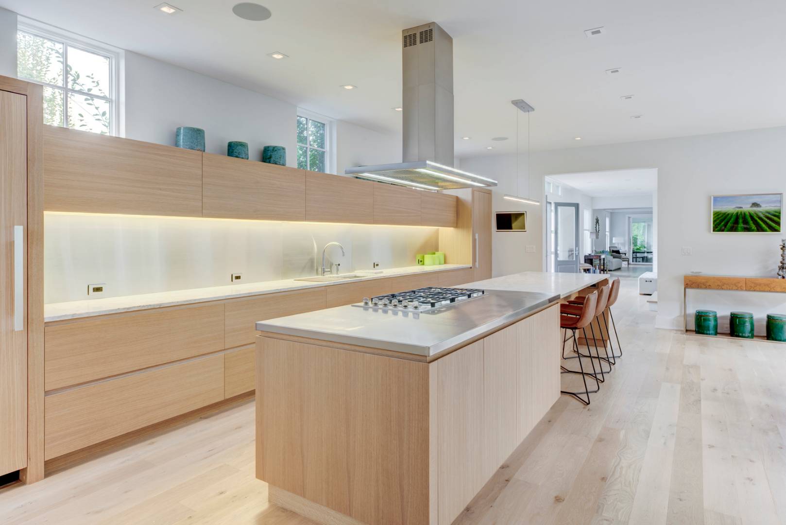83 School Street Bridgehampton, NY 11932 - Photo 8 of 19 a kitchen with a sink and cabinets