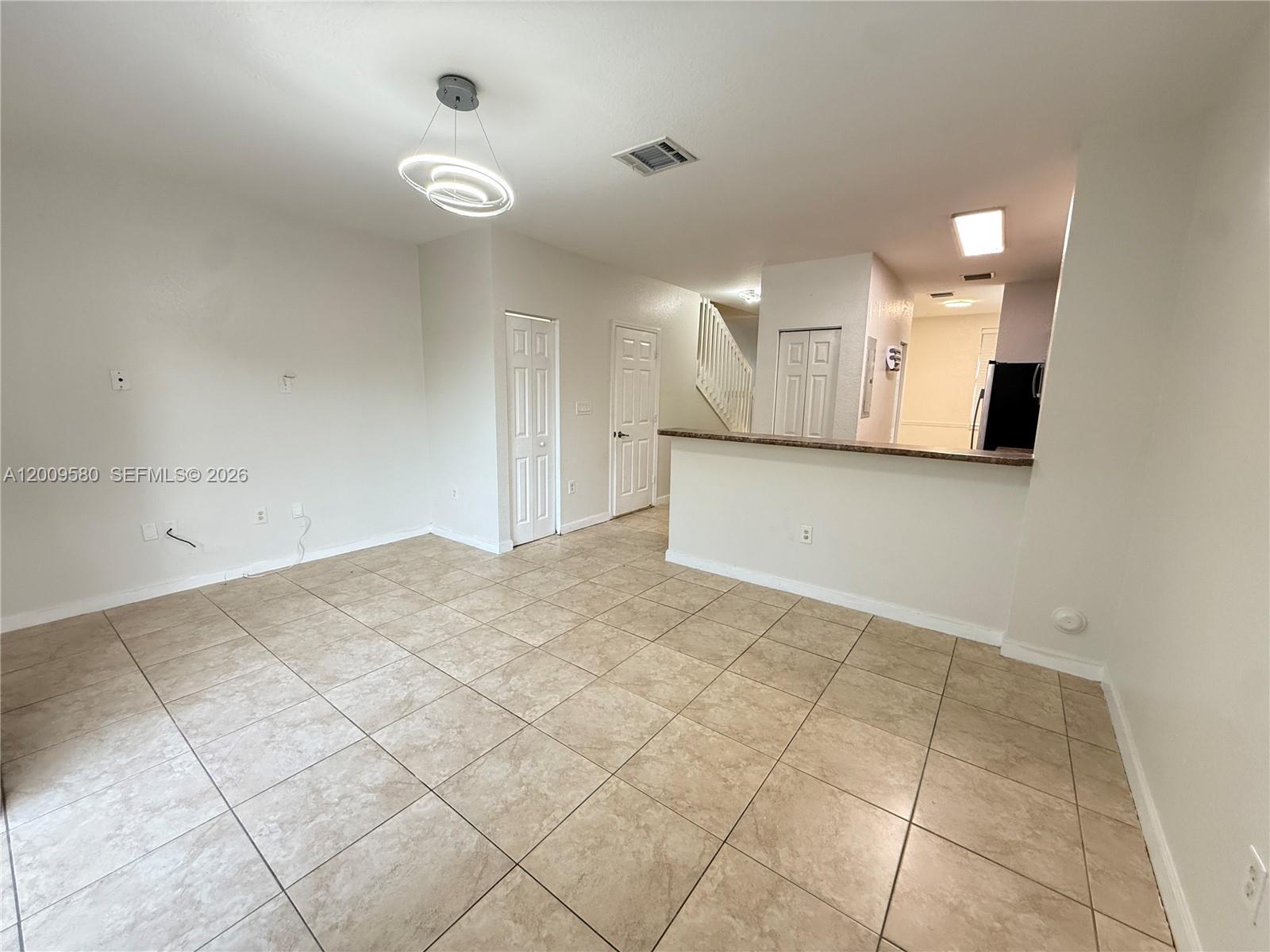 9239 Southwest 227th Street, Unit 1 Cutler Bay, FL 33190 - Photo 17 of 39 a view of a kitchen with a sink