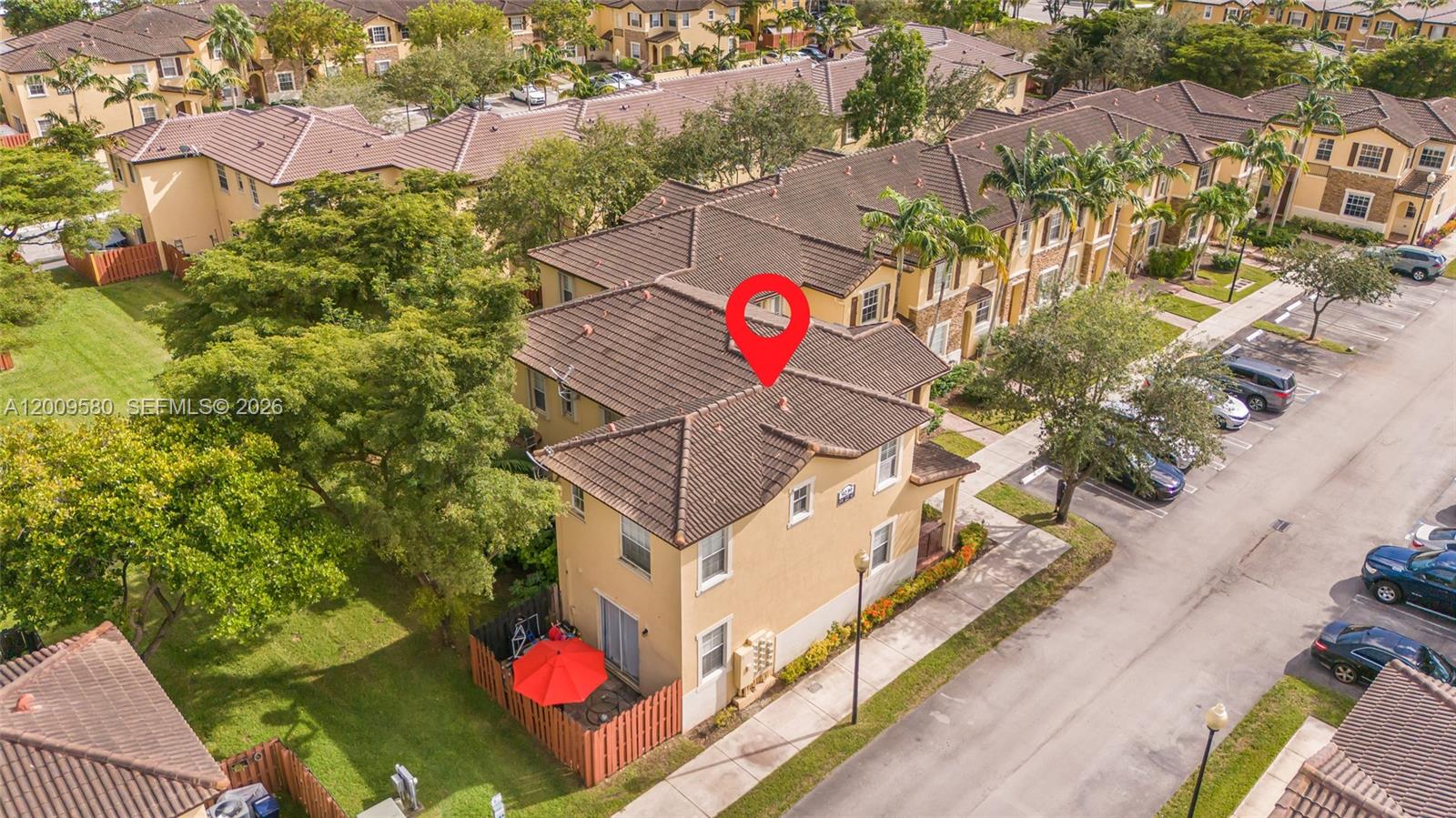 9239 Southwest 227th Street, Unit 1 Cutler Bay, FL 33190 - Photo 30 of 39 an aerial view of residential house with outdoor space