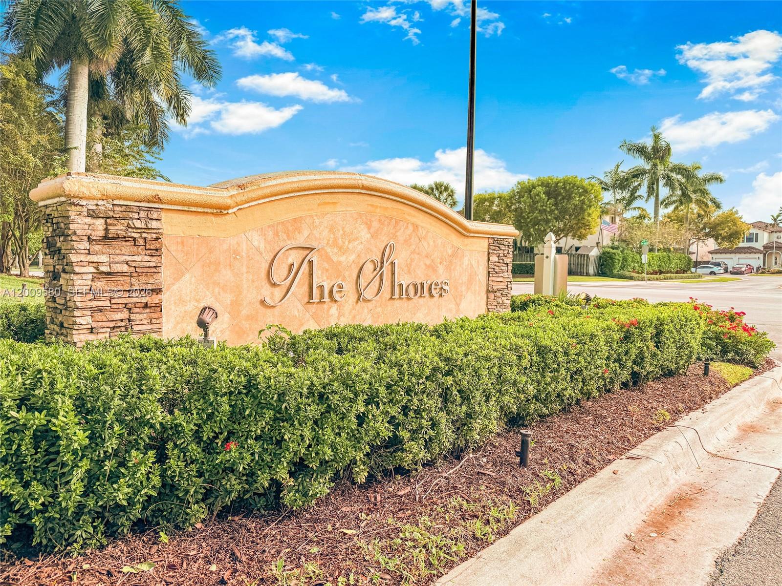 9239 Southwest 227th Street, Unit 1 Cutler Bay, FL 33190 - Photo 37 of 39 a sign on the side of a building