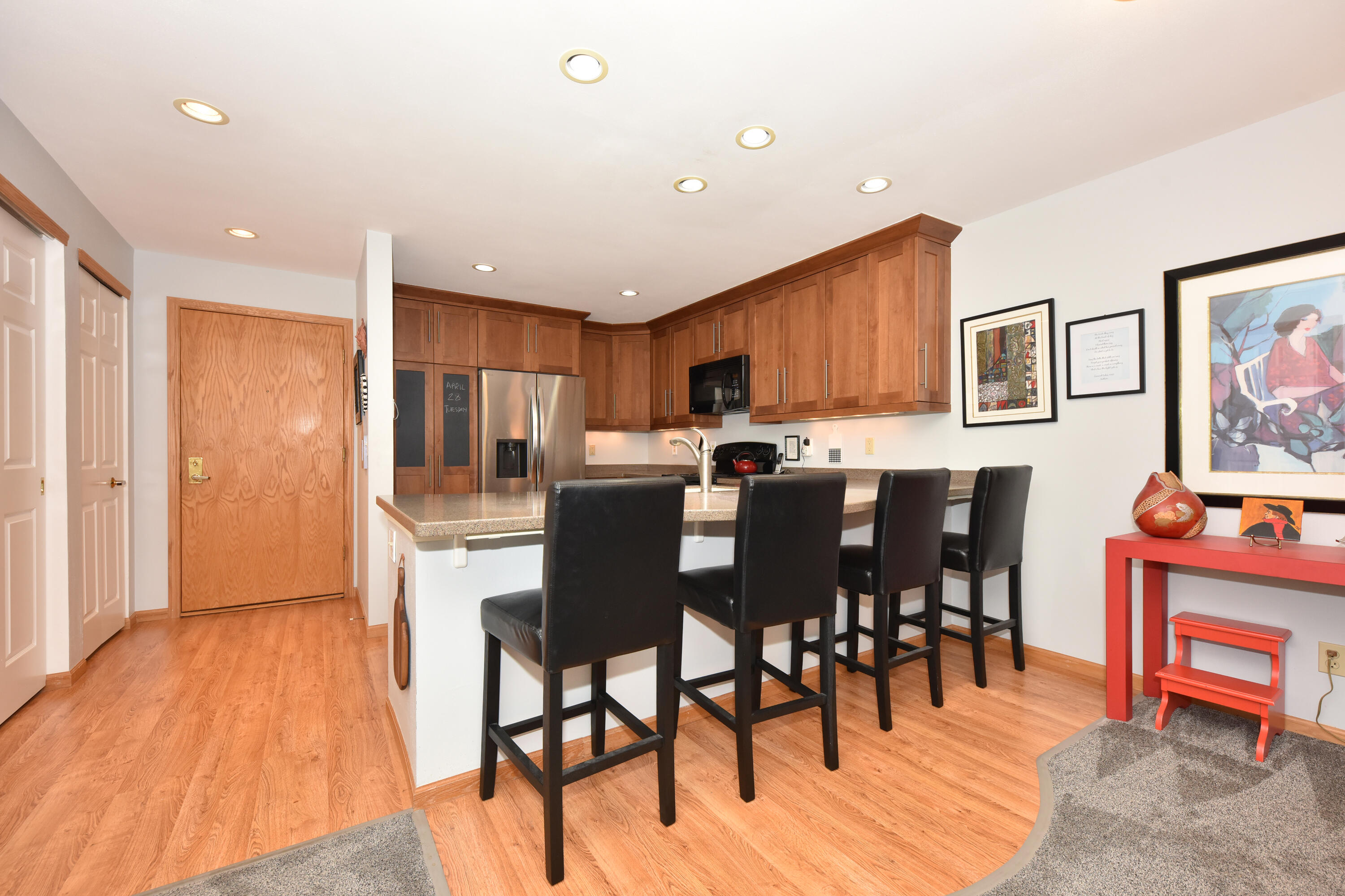 1600 West Green Tree Road, Unit 202 Glendale, WI 53209 - Photo 2 of 27 Entry Area with Breakfast Bar