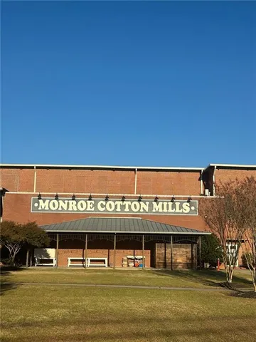 a view of building with glass door