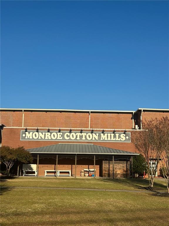 601 South Madison Avenue Monroe, GA 30655 - Photo 1 of 14 a view of building with glass door