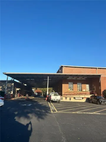 a view of a car park from a ceiling room