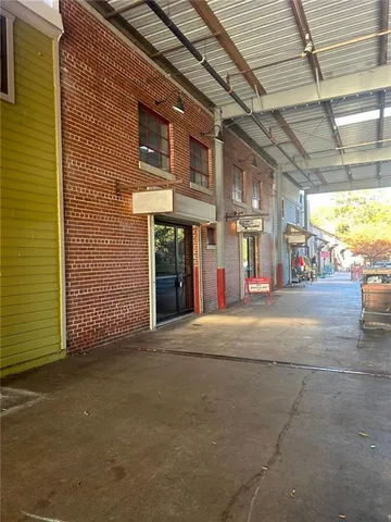 a view of a building with a street
