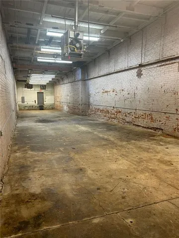 a view of a room with kitchen