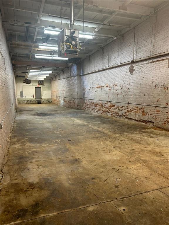 601 South Madison Avenue Monroe, GA 30655 - Photo 6 of 14 a view of a room with kitchen