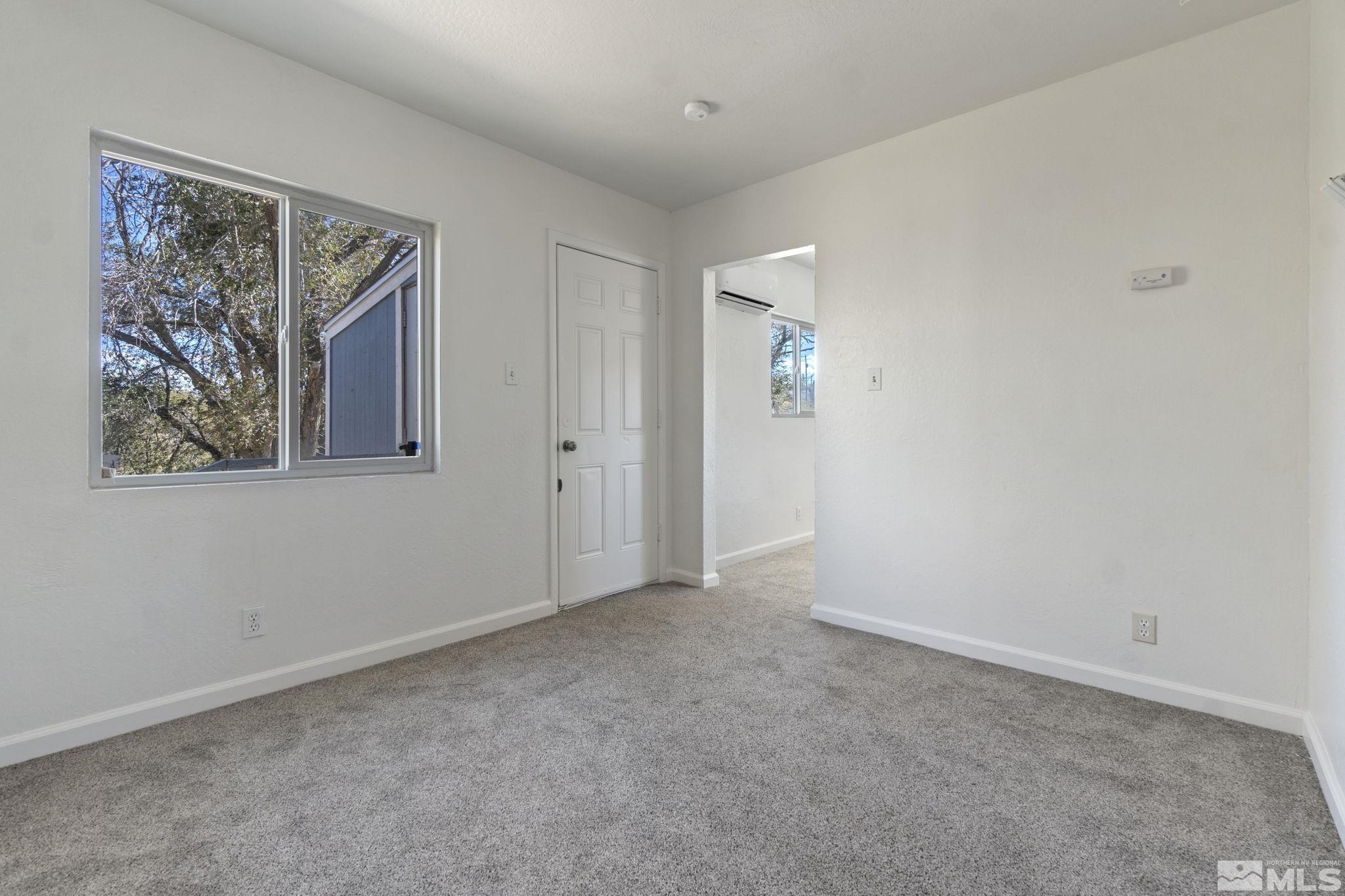 157 Walner Street Reno, NV 89506 - Photo 16 of 21 a view of an empty room with a window