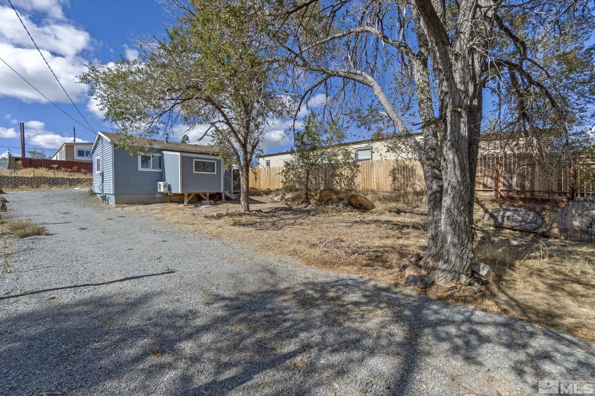 157 Walner Street Reno, NV 89506 - Photo 19 of 21 a view of a house with a snow in the yard