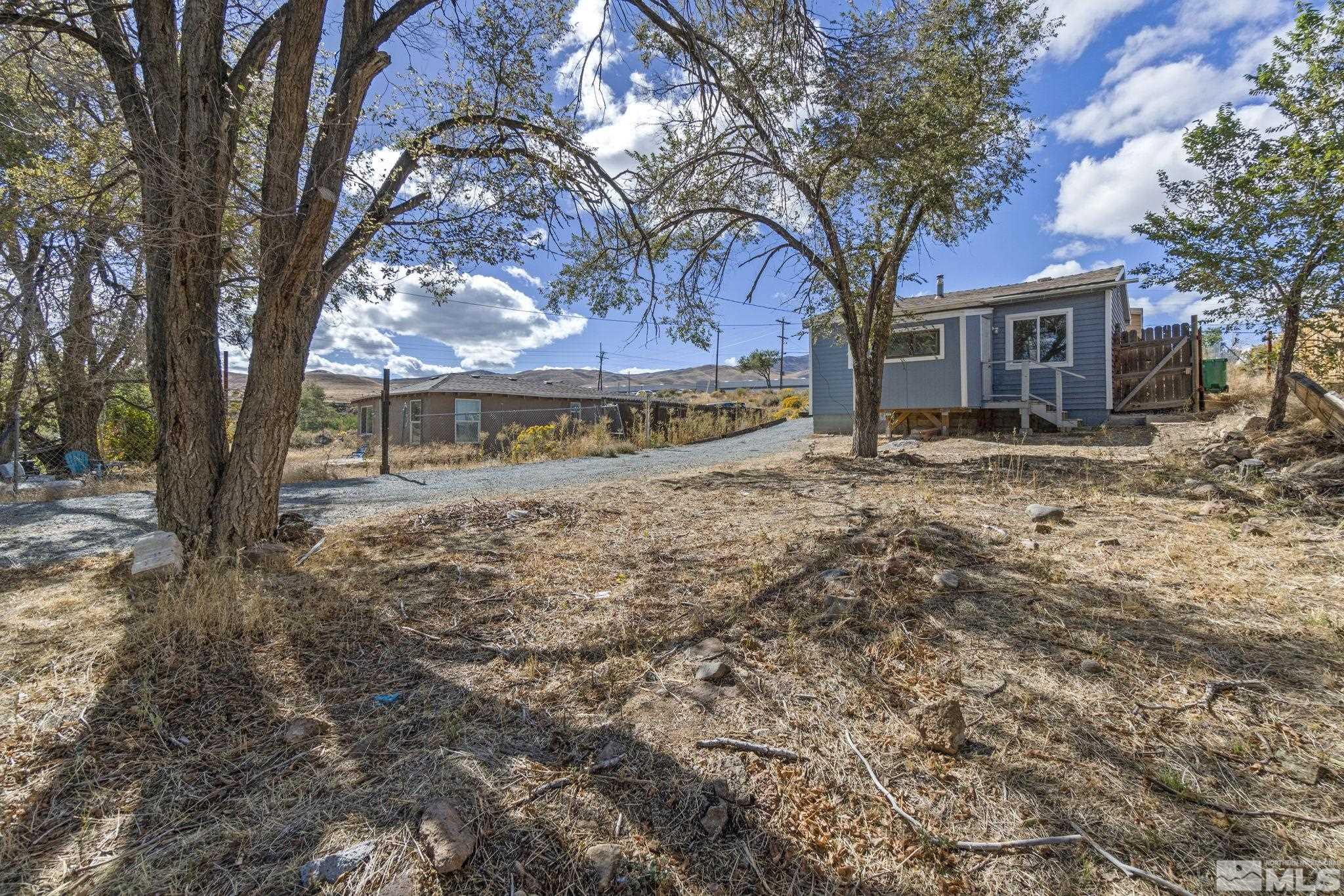 157 Walner Street Reno, NV 89506 - Photo 20 of 21 a view of a house with a yard