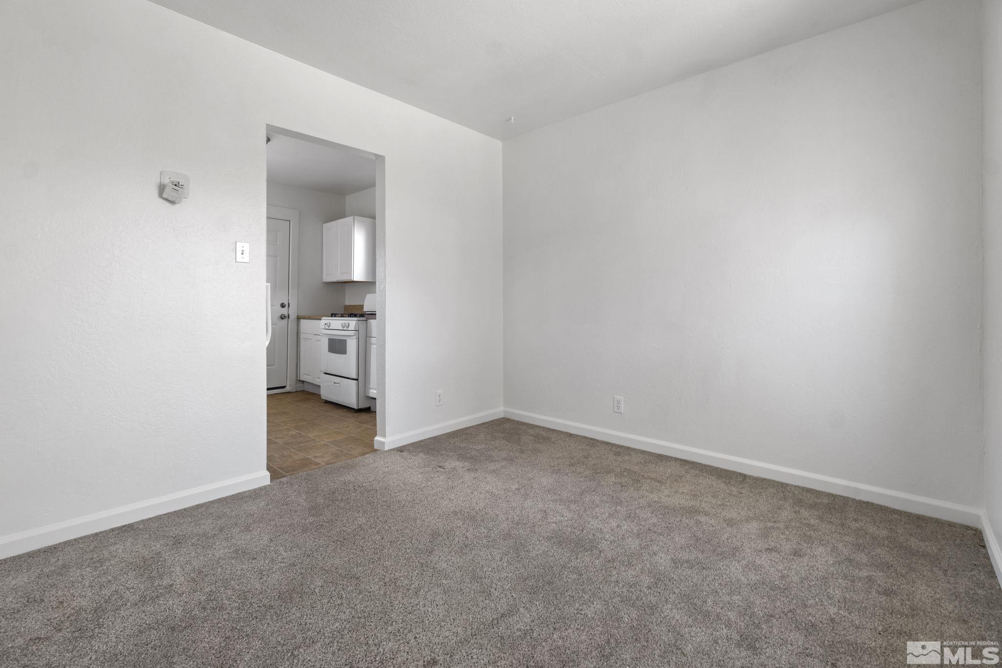 157 Walner Street Reno, NV 89506 - Photo 6 of 21 an empty room with a bathroom