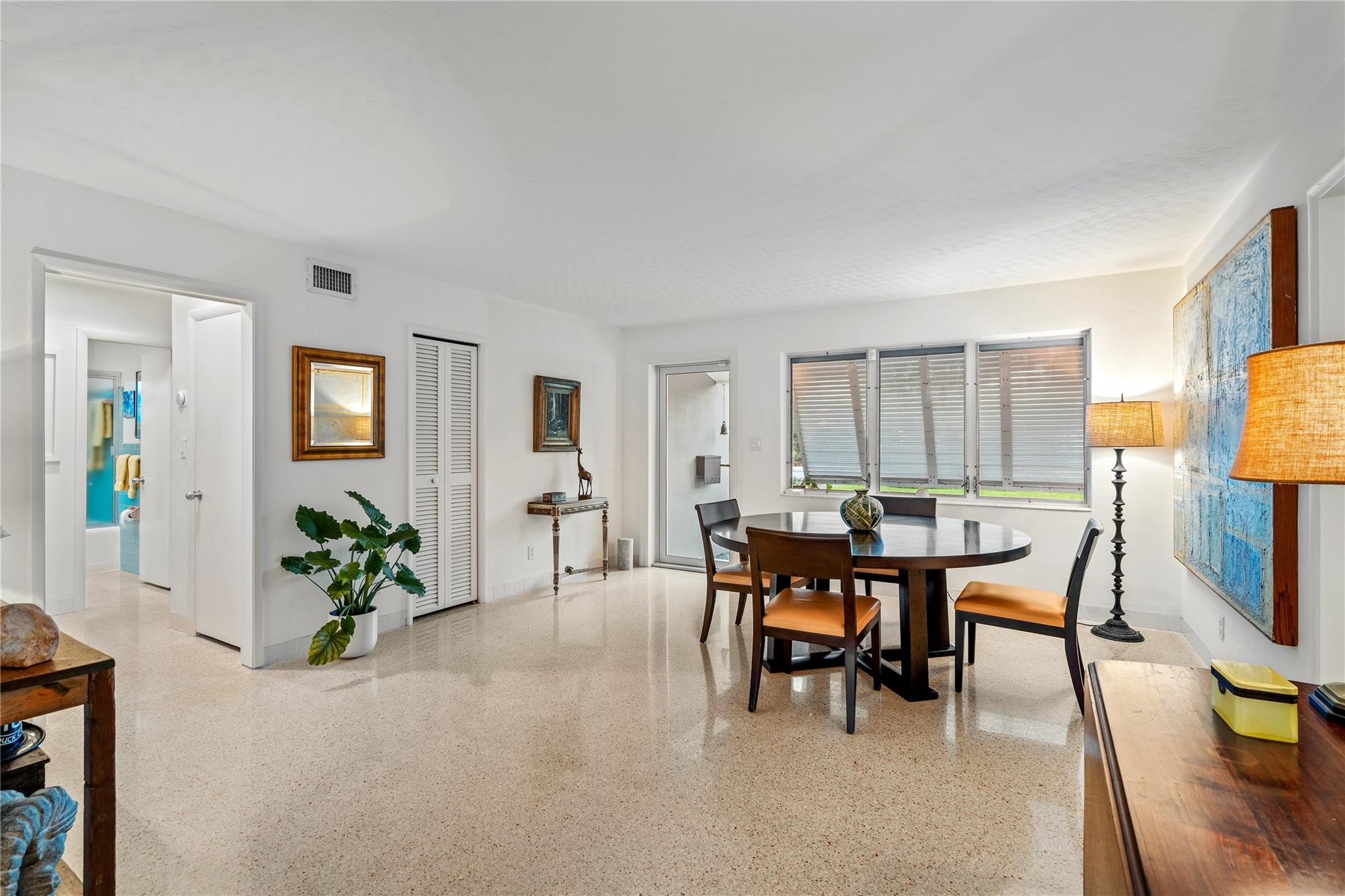 224 North Gordon Road Fort Lauderdale, FL 33301 - Photo 18 of 45 a view of a livingroom with furniture and a potted plant