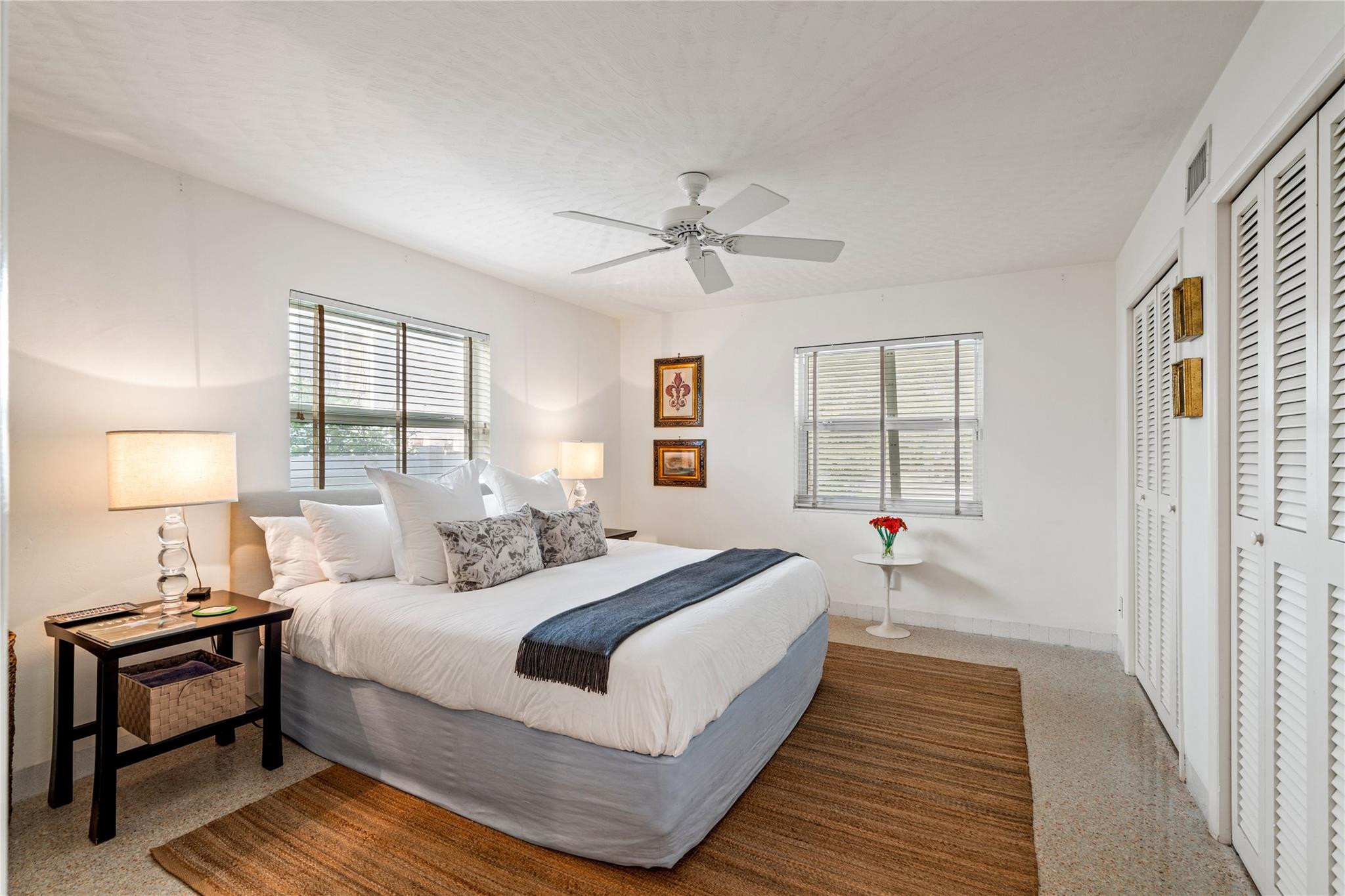 224 North Gordon Road Fort Lauderdale, FL 33301 - Photo 20 of 45 a bedroom with a bed and wooden floor