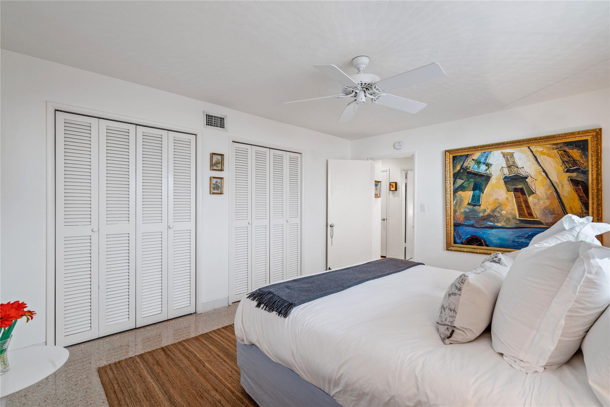 224 North Gordon Road Fort Lauderdale, FL 33301 - Photo 21 of 45 a bedroom with a bed and a painting on the wall