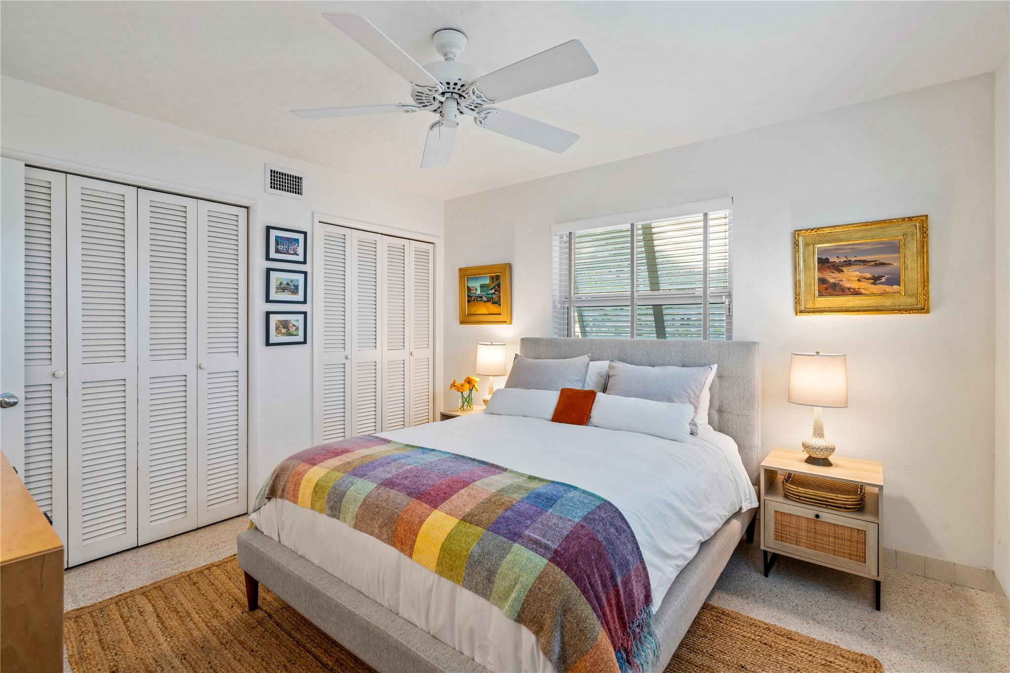 224 North Gordon Road Fort Lauderdale, FL 33301 - Photo 24 of 45 a bedroom with a bed and wooden floor