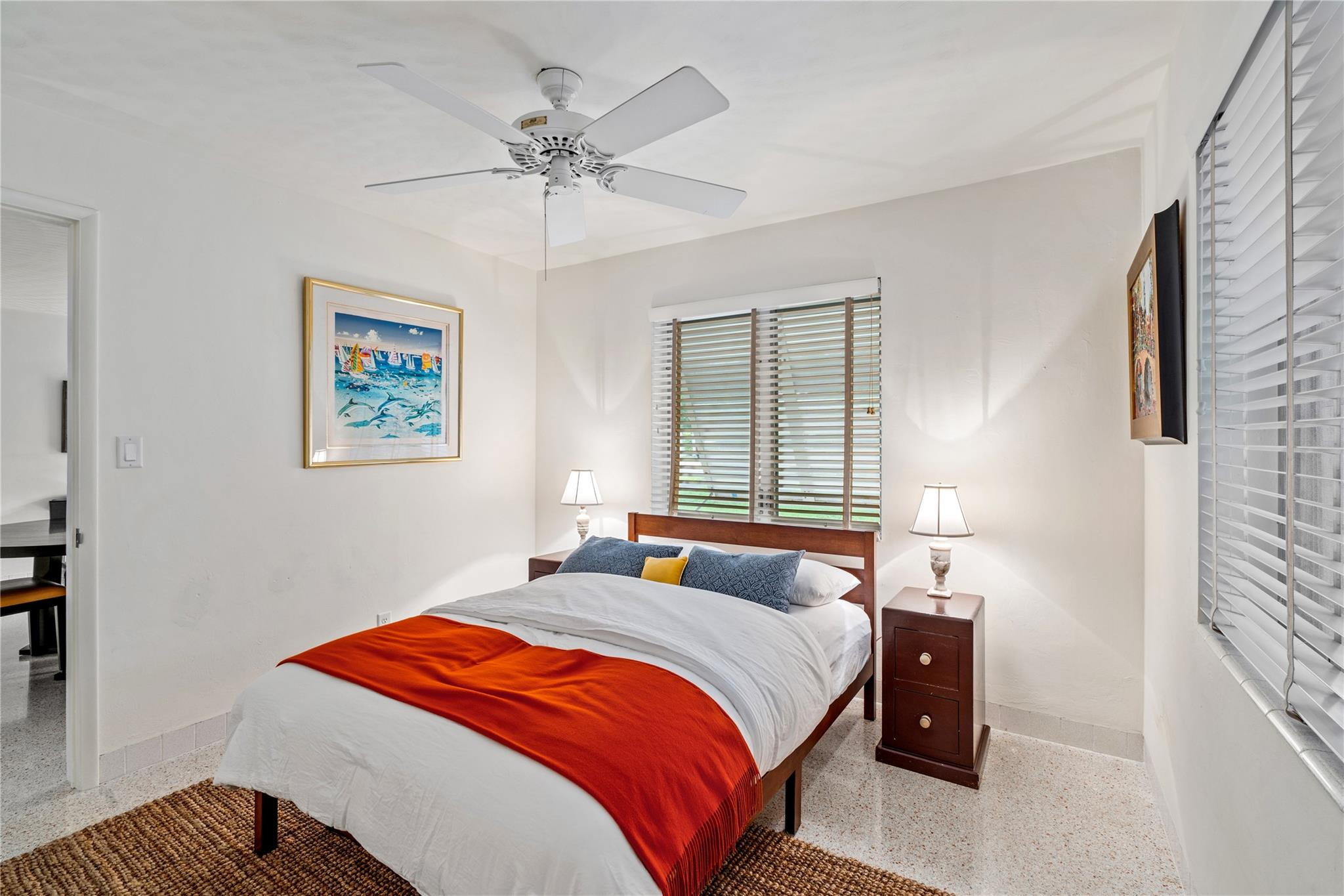 224 North Gordon Road Fort Lauderdale, FL 33301 - Photo 27 of 45 a bedroom with a bed and a chandelier