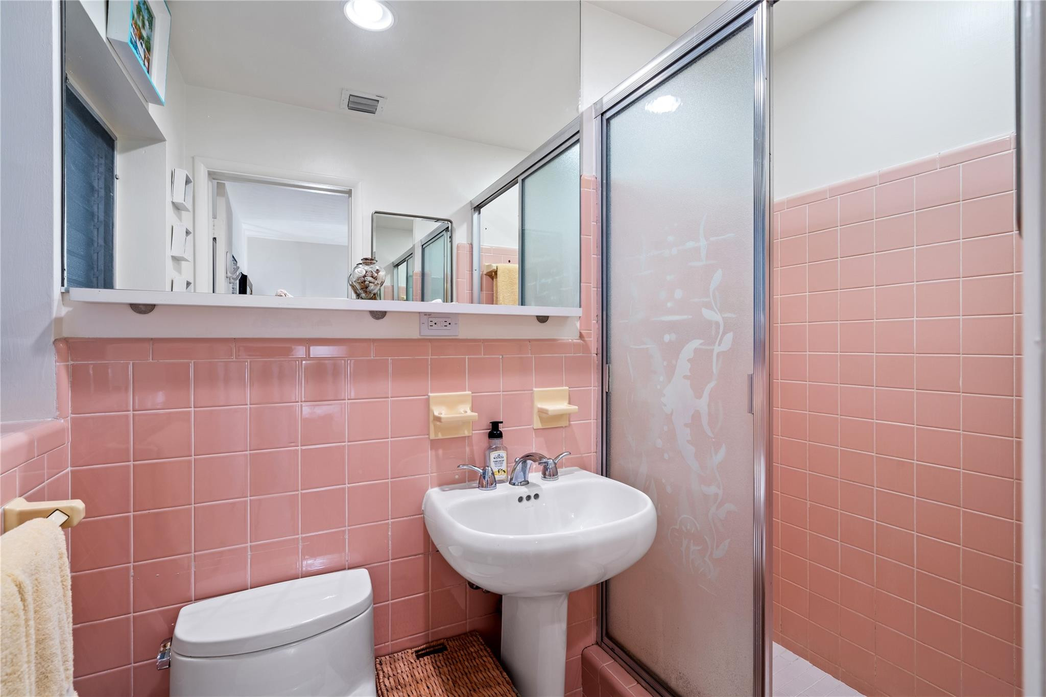 224 North Gordon Road Fort Lauderdale, FL 33301 - Photo 28 of 45 a bathroom with a sink mirror and toilet
