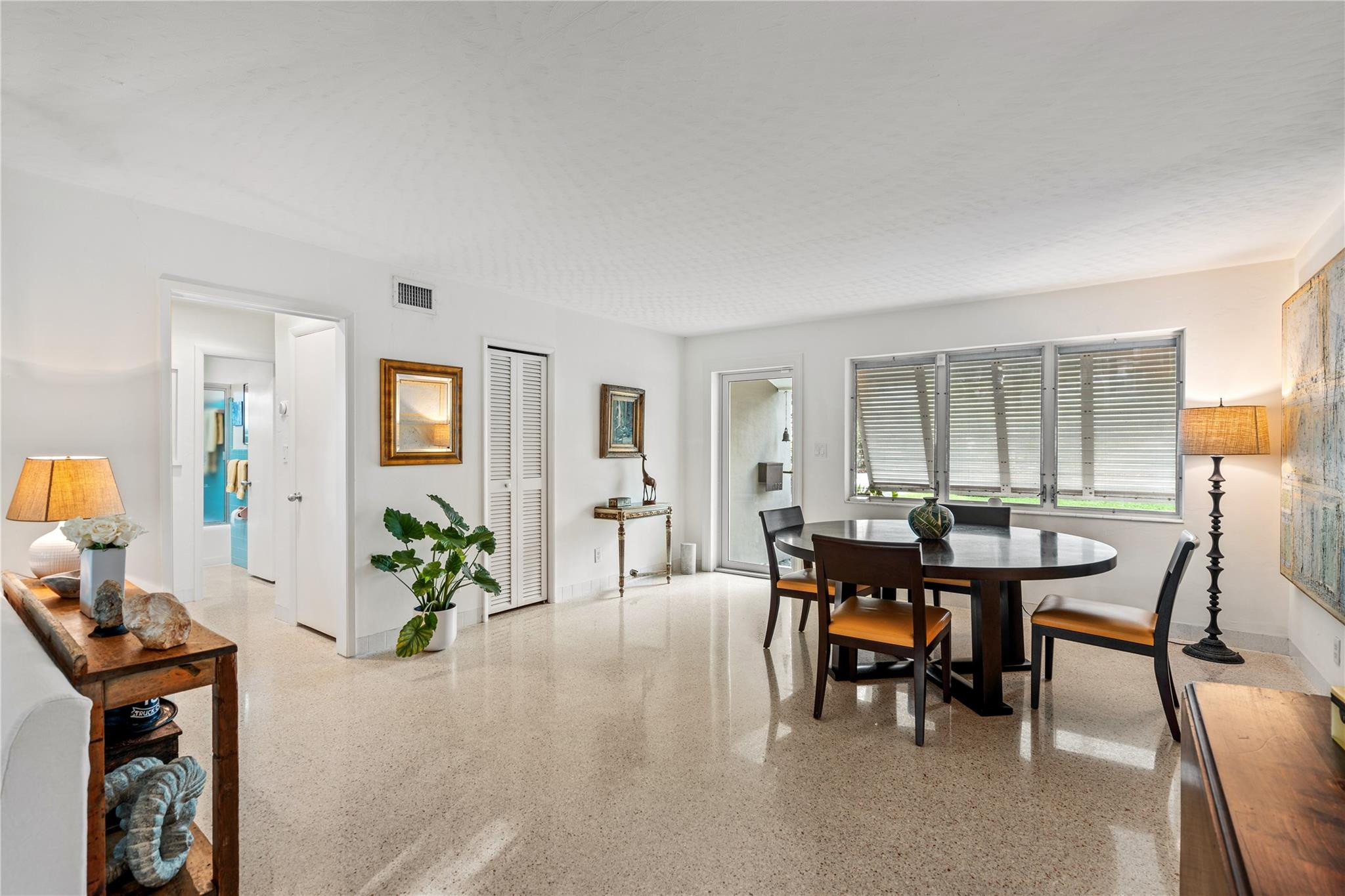 224 North Gordon Road Fort Lauderdale, FL 33301 - Photo 29 of 45 a dining room with furniture and window