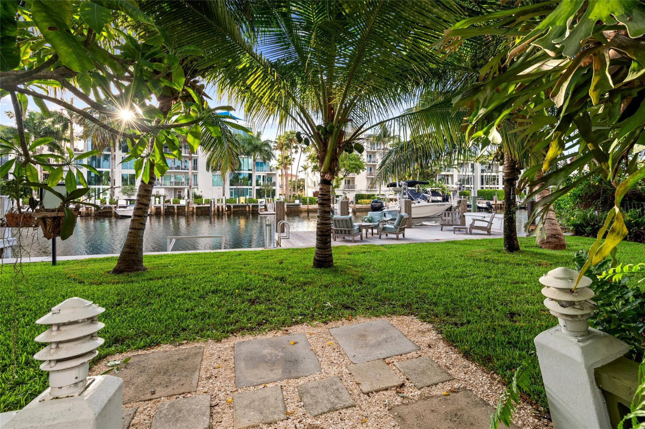 224 North Gordon Road Fort Lauderdale, FL 33301 - Photo 35 of 45 a garden with palm trees