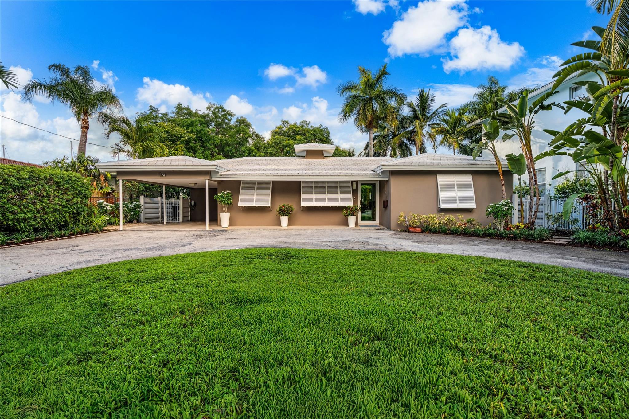 224 North Gordon Road Fort Lauderdale, FL 33301 - Photo 41 of 45 a view of a house with a patio