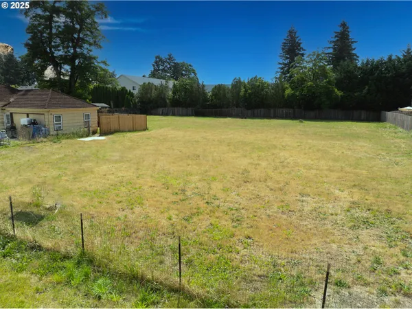 a view of lot of green space and trees