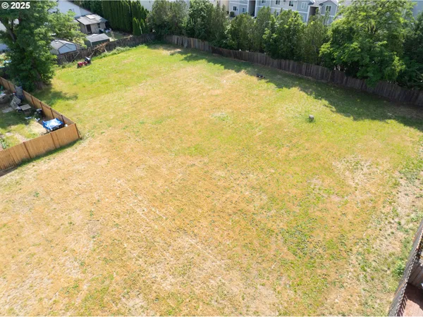 a view of a swimming pool and an outdoor space